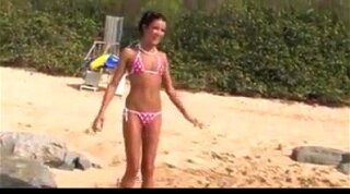 Nude beach - college girl photo shoot pee